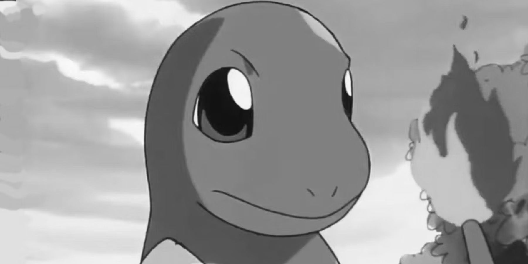 A close-up screenshot of Charmander from the Pokemon anime in greyscale.