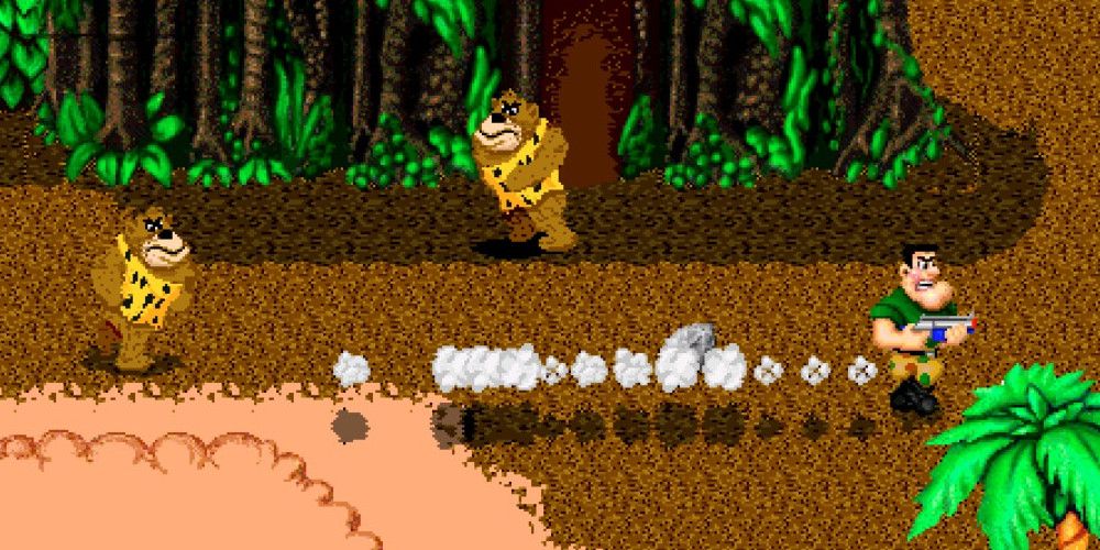 Power Pete (right) running from two cavemen toys in a jungle environment.