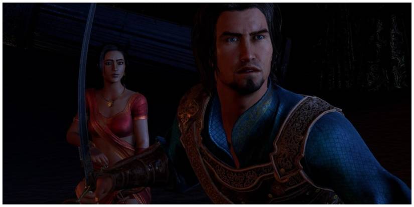 The Prince standing protectively in front of Farah with his sword raised in Prince Of Persia The Sands Of Time