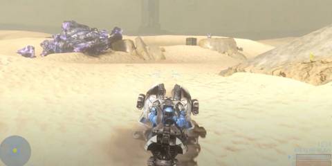 Spartan driving a chopper through sandbox 