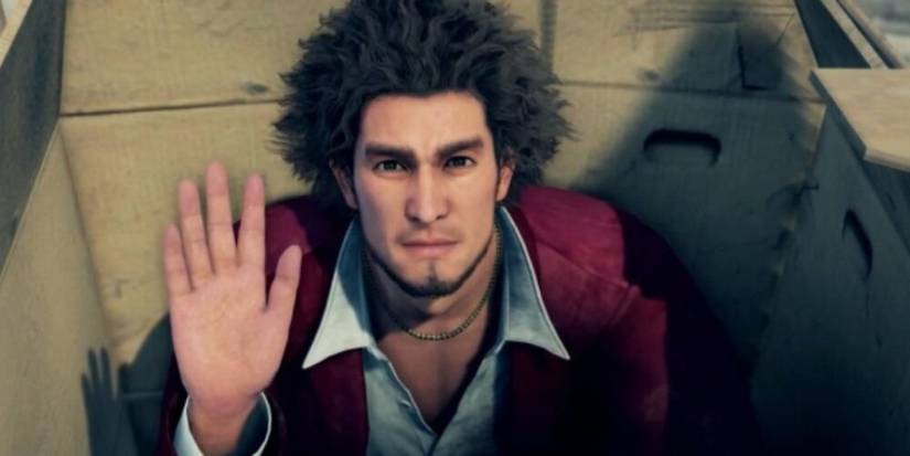 Ichiban sitting in a box in Yakuza: Like A Dragon