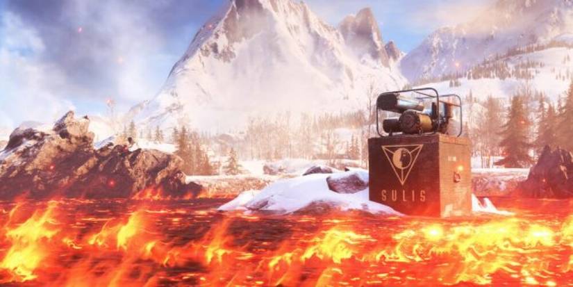 Flames with a snowy mountain in the background 