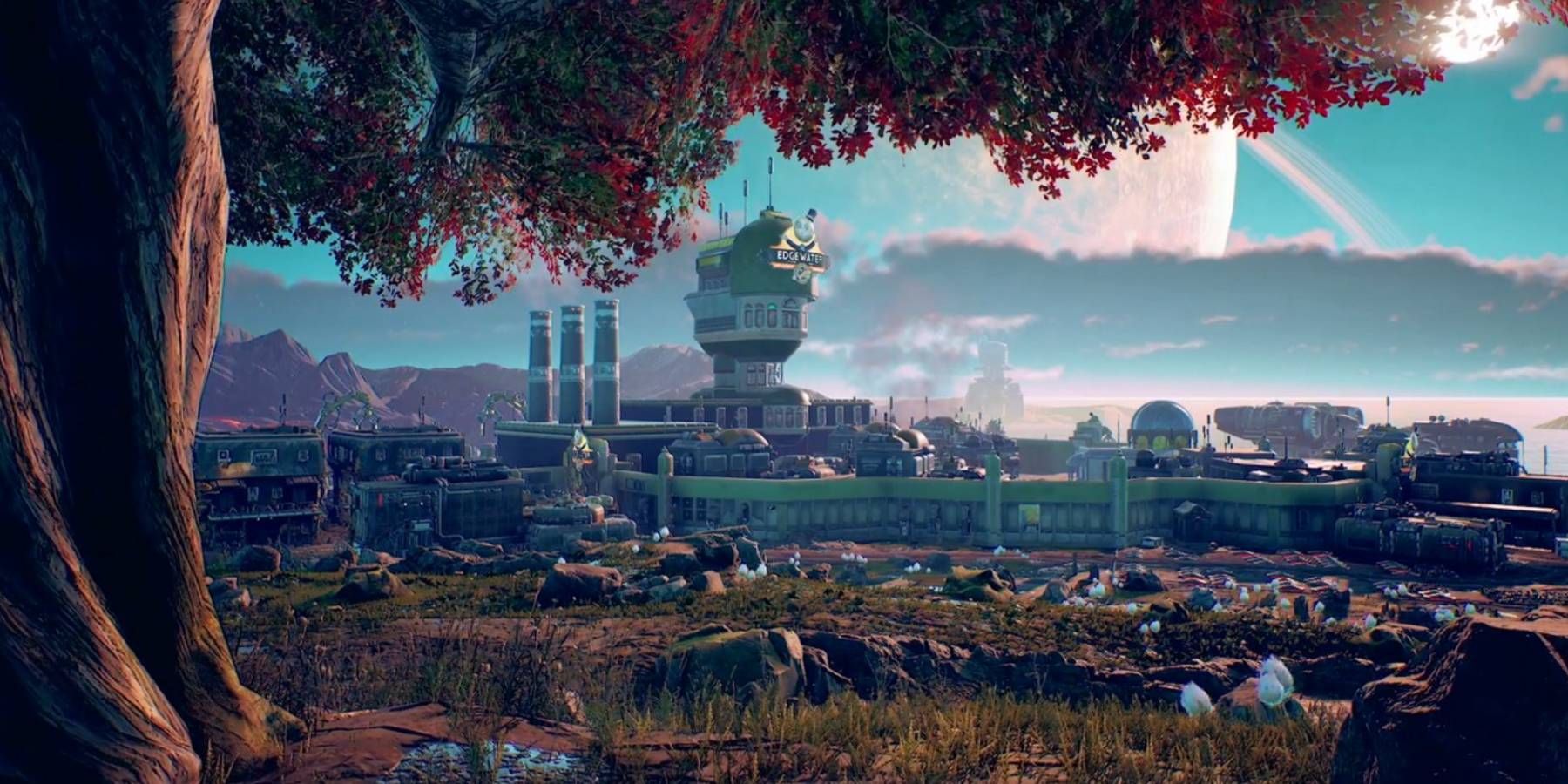 A look at Edgewater from beside a tree in The Outer Worlds