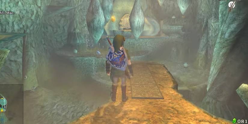 link standing on a ledge in the lakebed temple