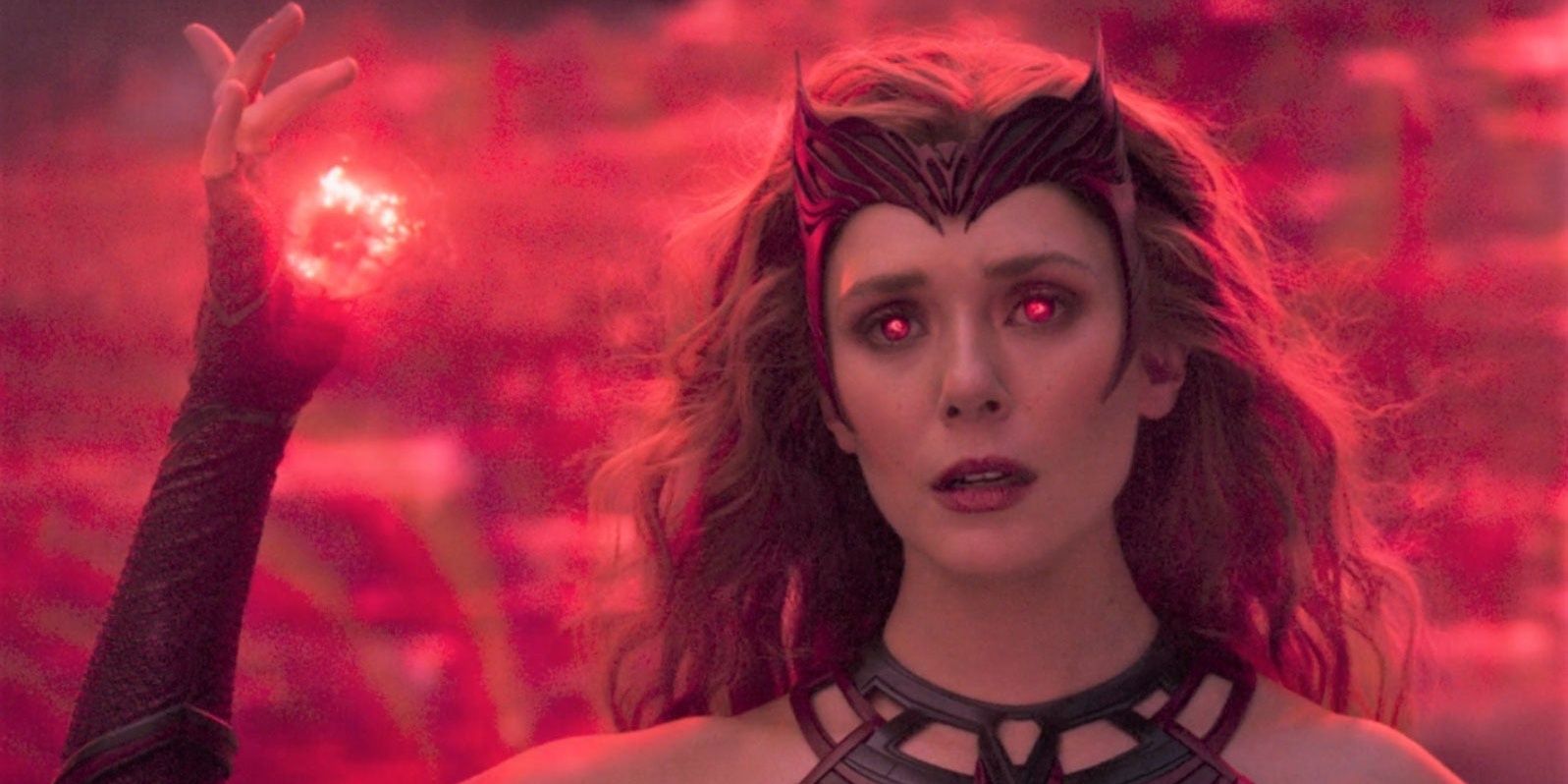 An image of Wanda (Scarlet Witch) glowing her eyes