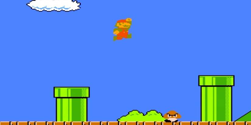 mario jumping over a pipe in mario bros