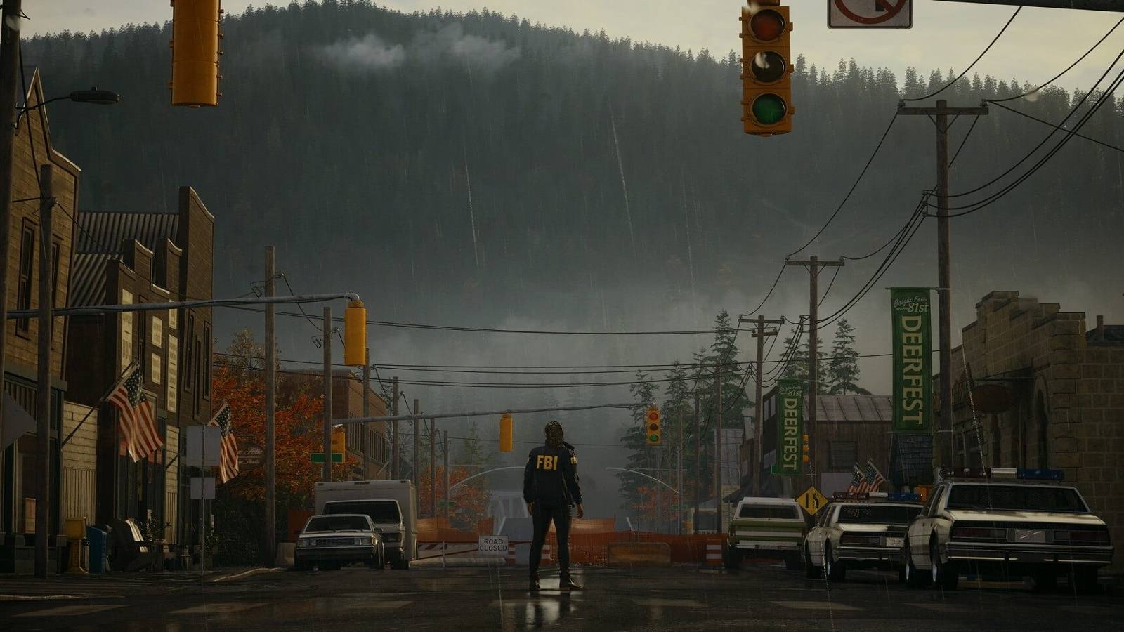 an alan wake character stands in an empty street