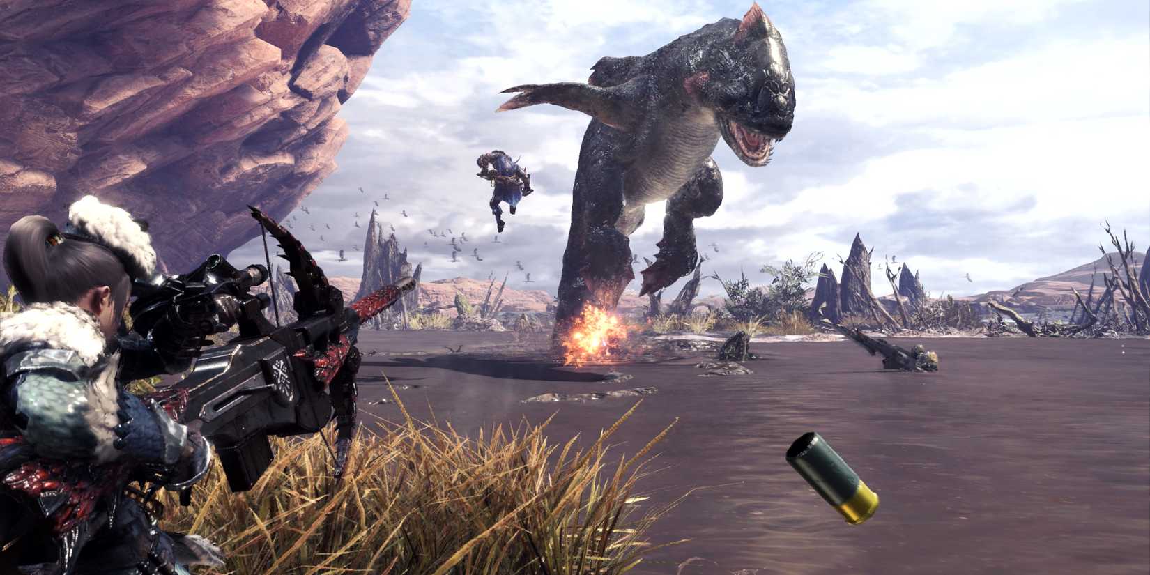a Gunner shooting Blast coatings at a Jyuratodus in Monster Hunter World