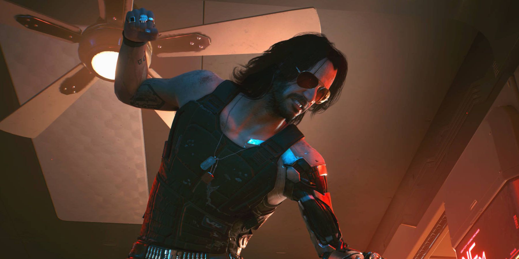 A screenshot of Johnny Silverhand fighing in a club in Cyberpunk 2077.