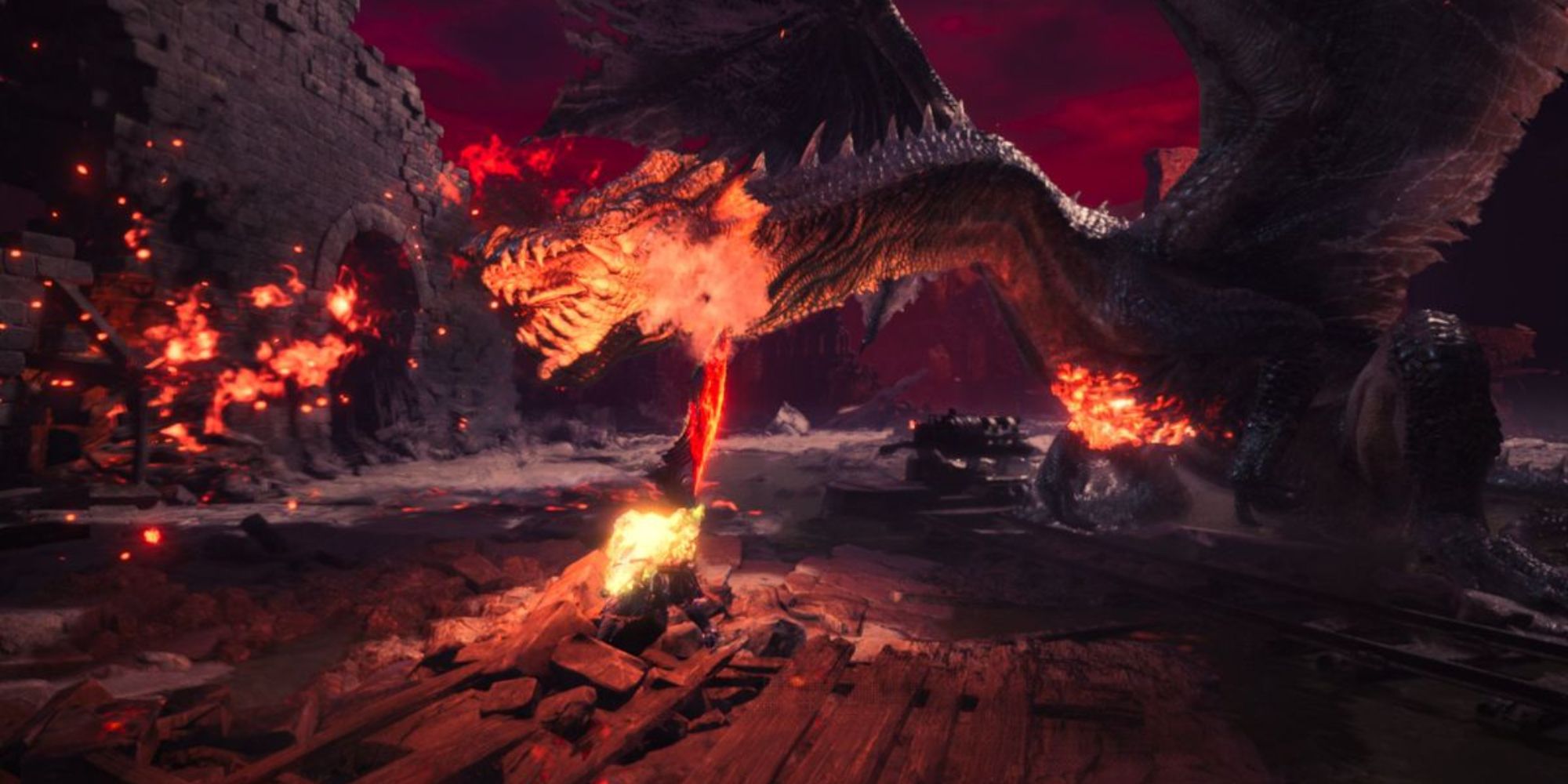 A hunter swinging a Fire weapon at a Fatalis in Monster Hunter World