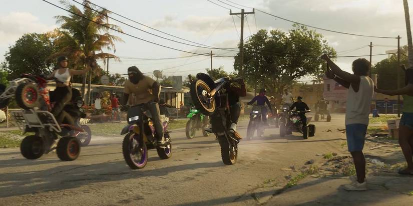 Bikers doing wheelies and riding in formation