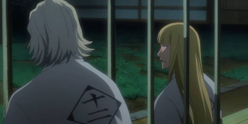 An image of two characters locked in a cage ​​​​​​​in The Past Arc.