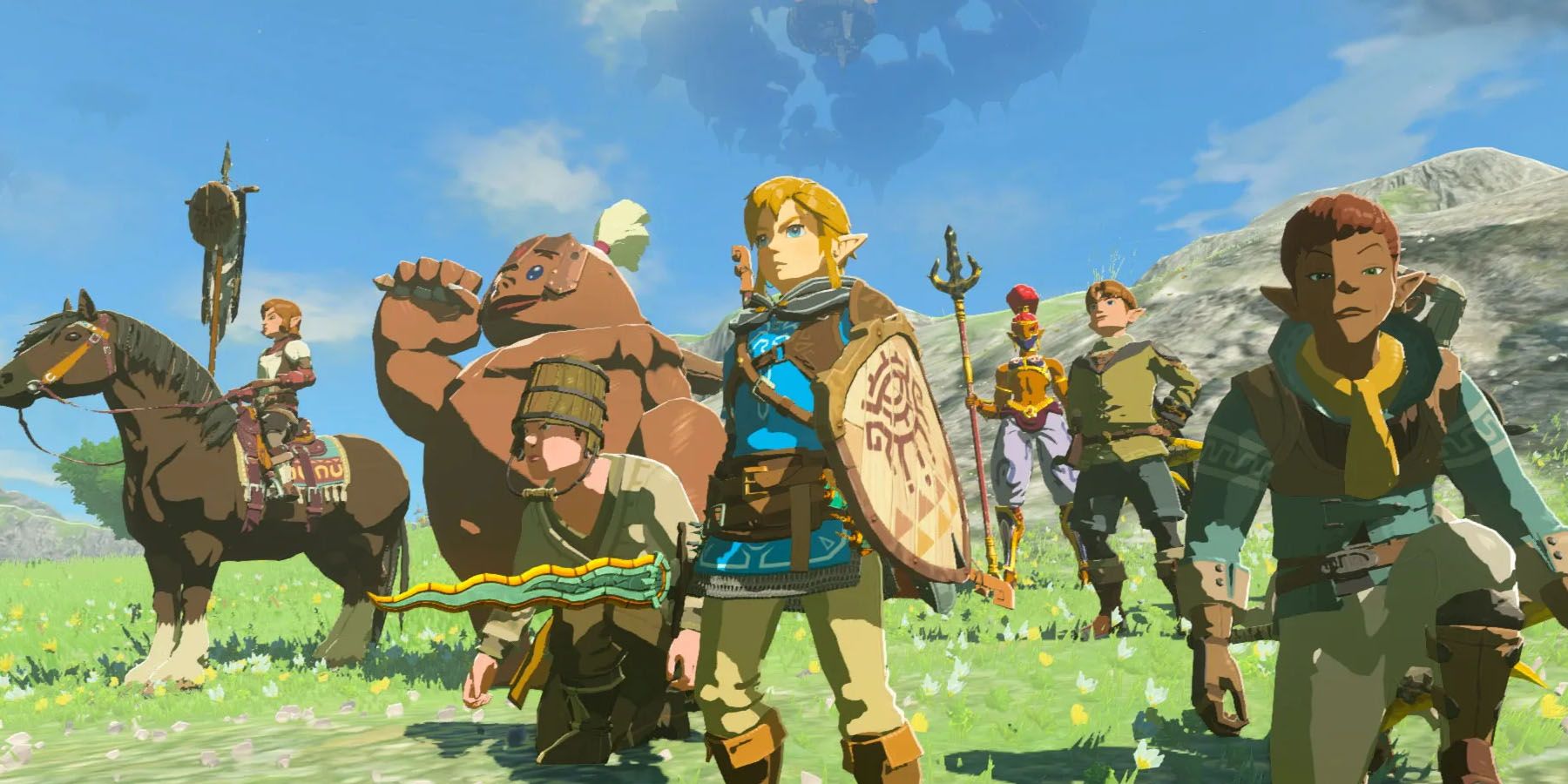 A screenshot of Link and his friends standing in a grassy field in The Legend of Zelda: Tears of the Kingdom.