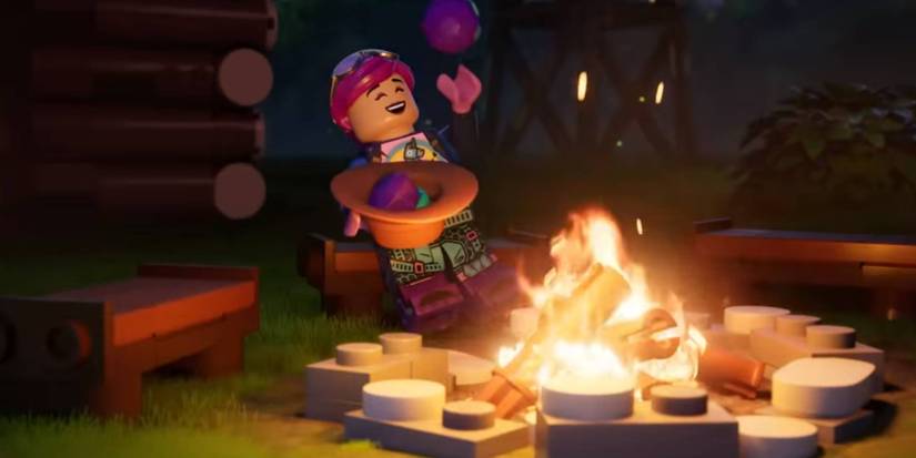 Brite Bomber eating by a campfire in LEGO Fortnite's trailer