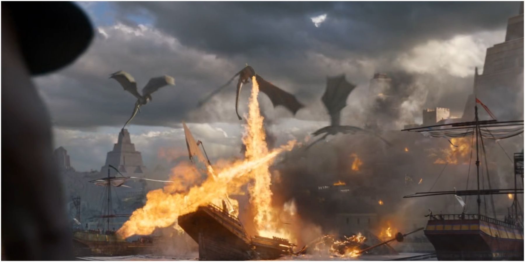 Drogon Viserion and Rhaegal burning ships in Game of Thrones.