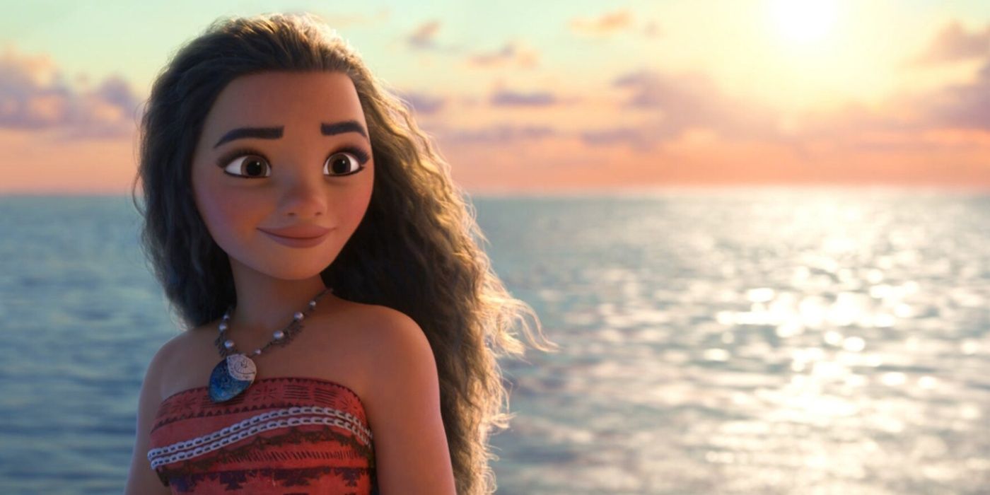 Moana looking forward with the sunset and ocean behind her