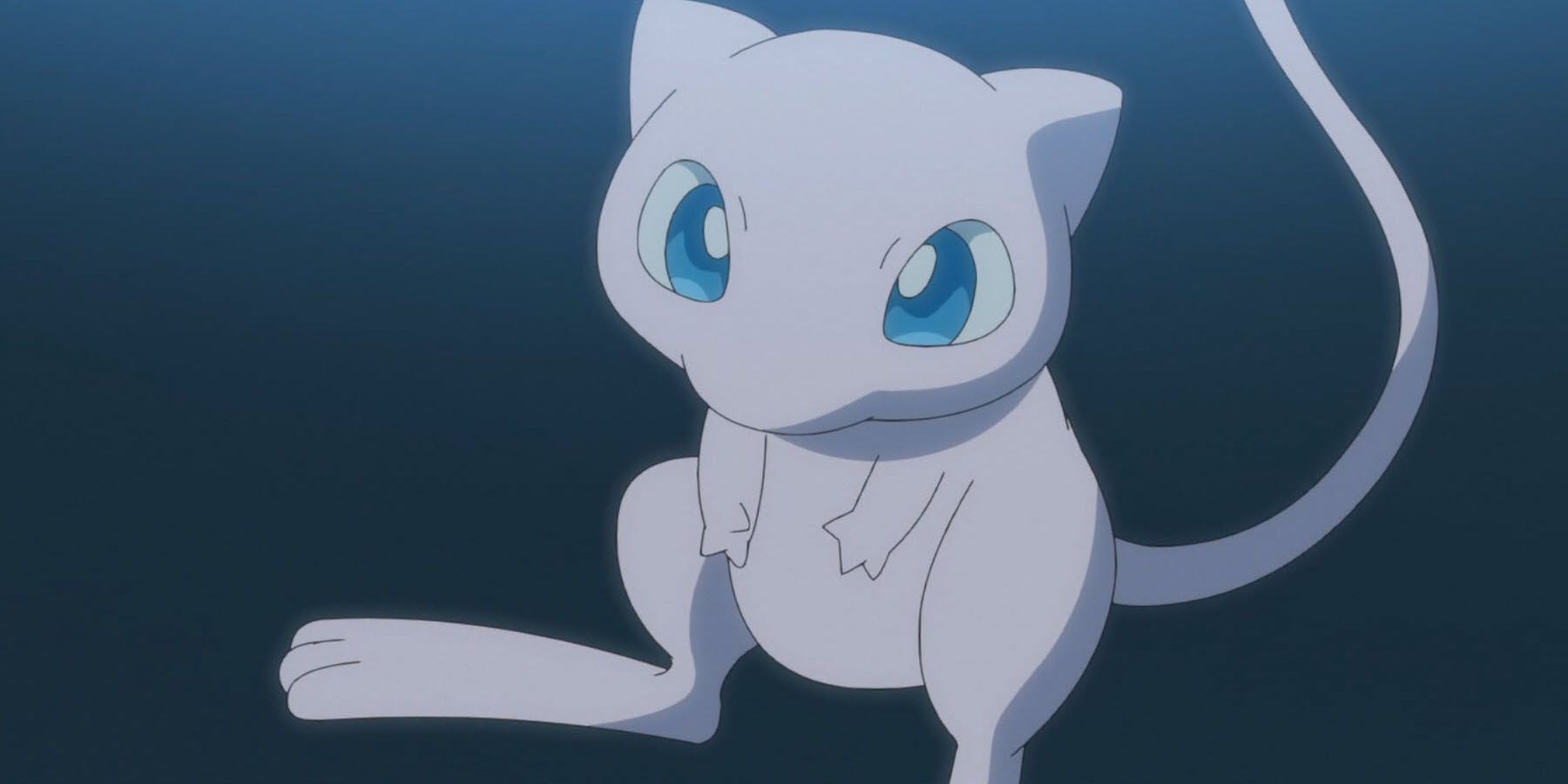 A screenshot of Mew floating in a dark cave in the Pokemon anime.