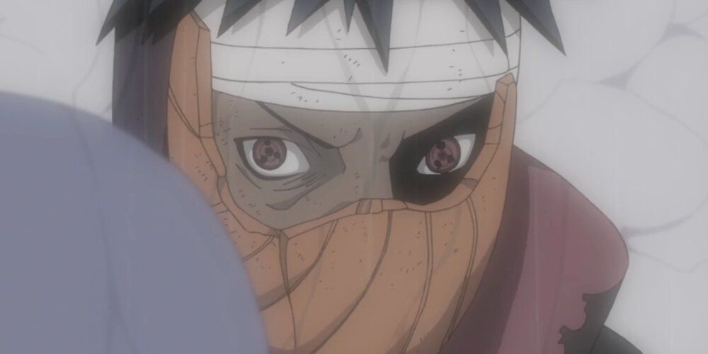 Obito with half of his mask cracked 