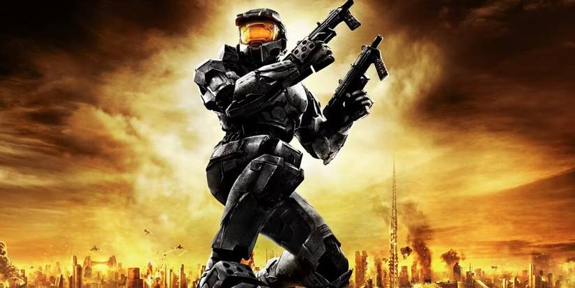 Master Chief holding two SMGs