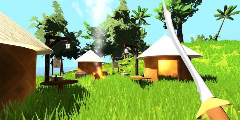 Player standing in a village with a sword equipped 