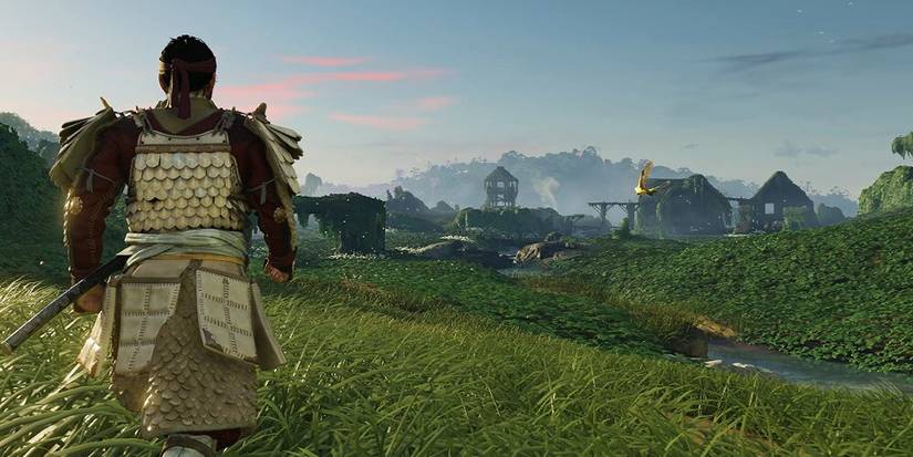 Jin Sakai looking over a village 