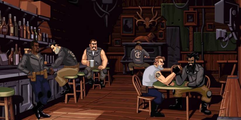 Bikers sitting around in a bar