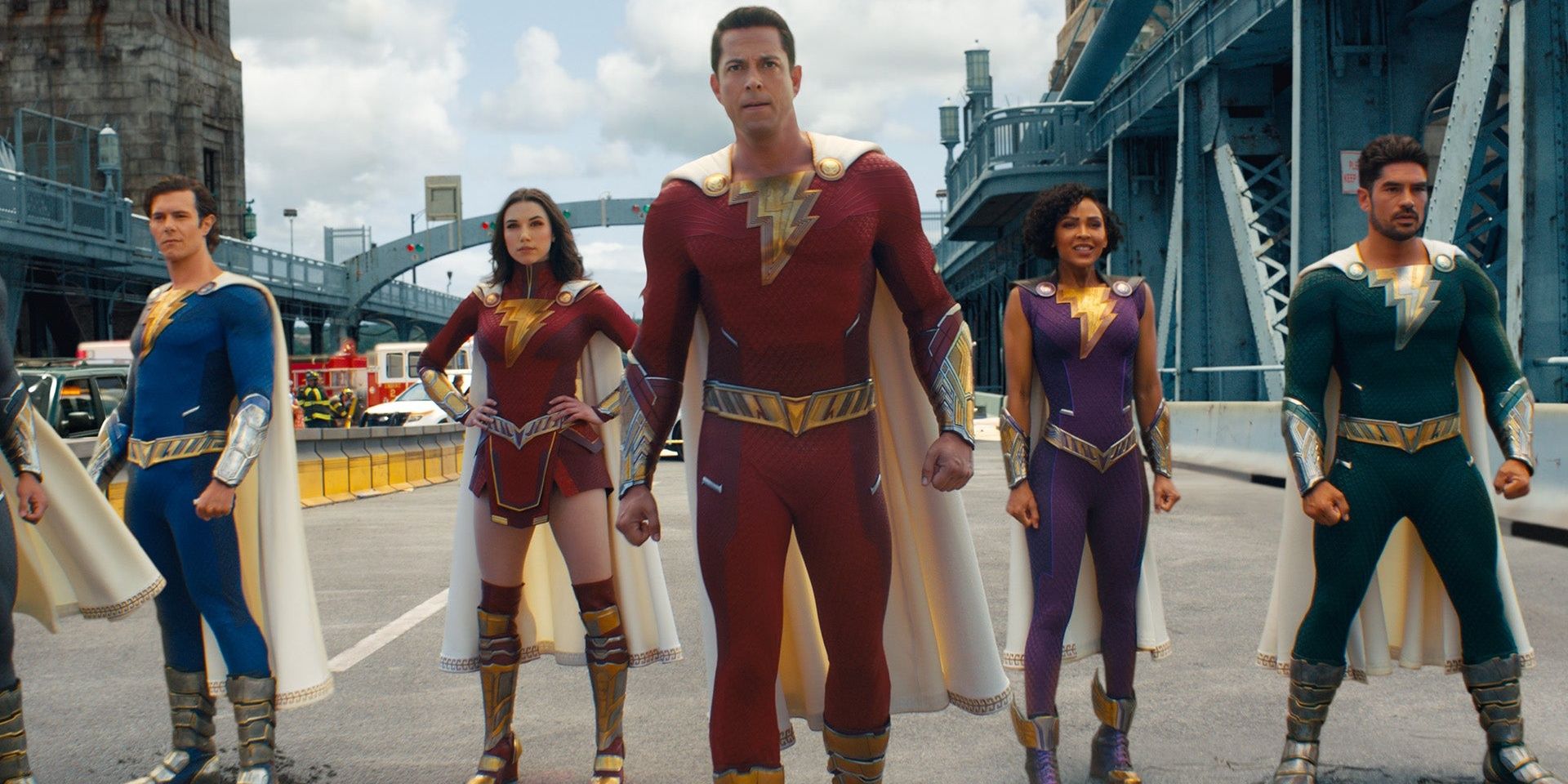 An image of Shazam and his adopted siblings in their superhero form