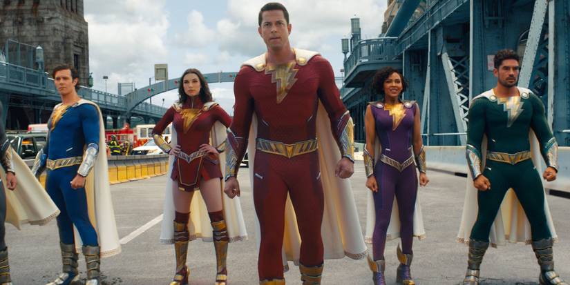 An image of Shazam and his adopted siblings in their superhero form