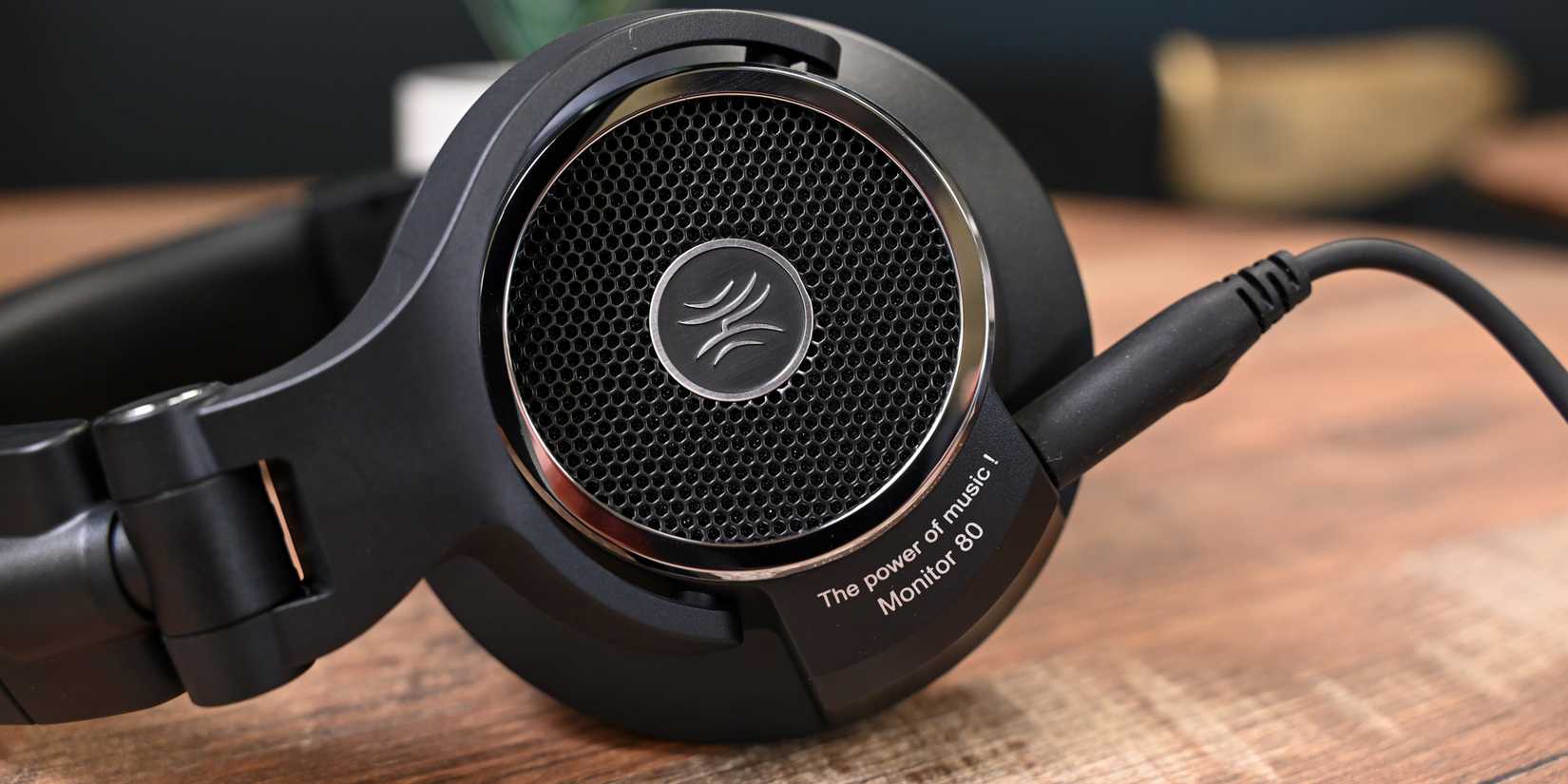 Side of the OneOdio Monitor 80 Open Back Headphones with the AUX plugged in