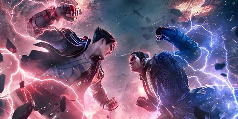 A promotional image of Jin and Kazuya fighting each other with red and blue energy flowing around them in Tekken 8.
