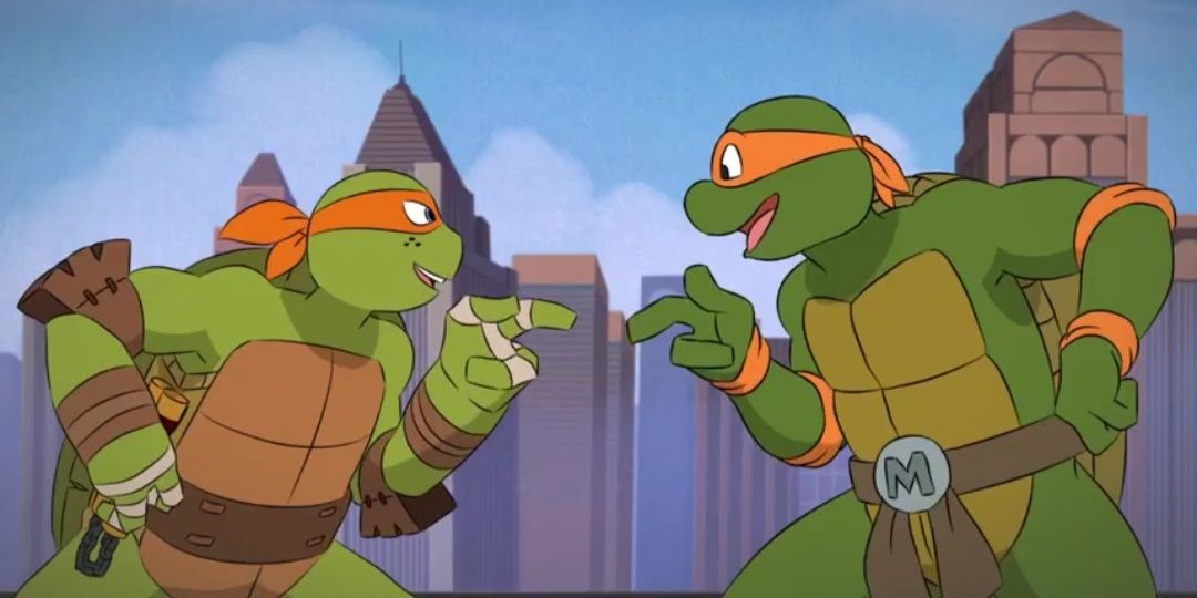 Uma imagem de duas tartarugas ninja mutantes adolescentes apontando uma para a outra de uma forma engraçada