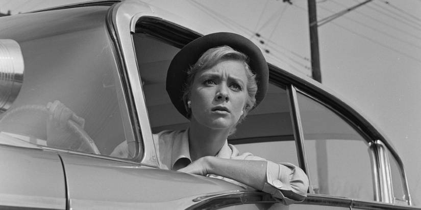 Twilight Zone Inger Stevens looking off camera from car