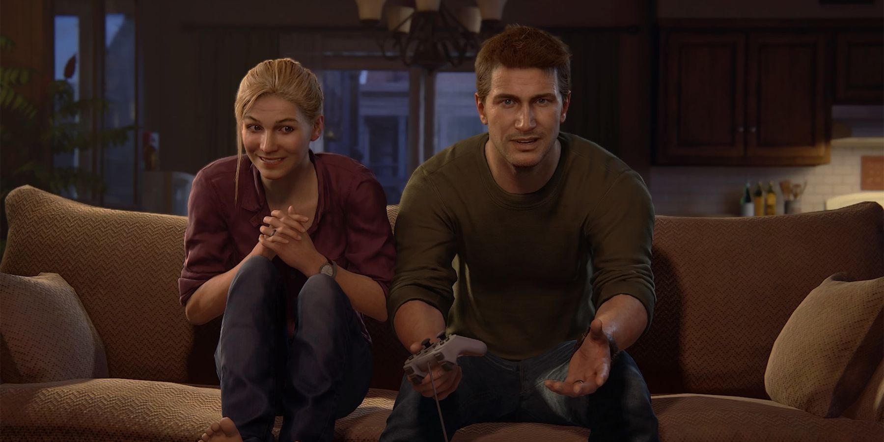 uncharted 4 nathan and elena playing playstation on couch