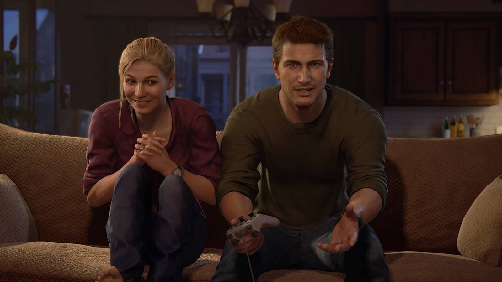 uncharted 4 nathan and elena playing playstation on couch