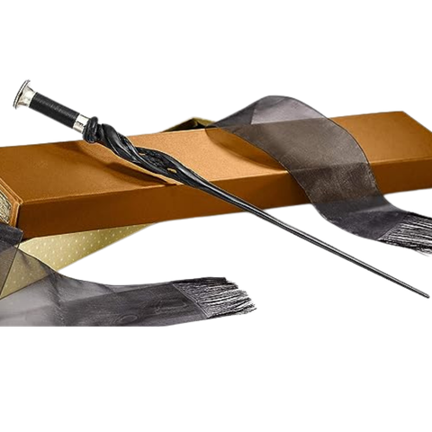 This image shows Young Albus Dumblebore's wand from the Fantastic Beasts and Harry Potter series leaning against its box