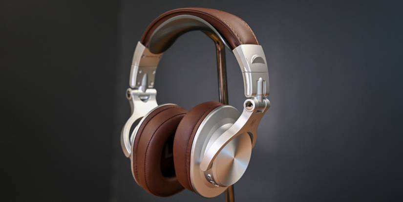 A pair of OneOdio Fusion A70 on a headphone stand-3