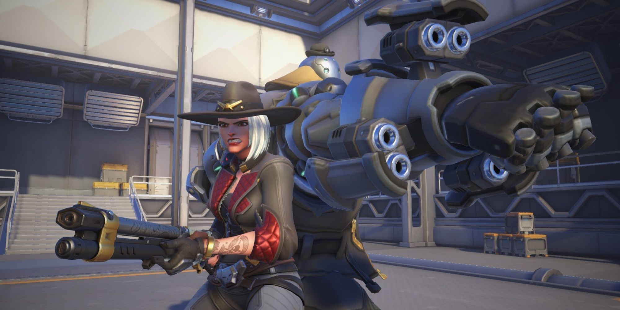 Ashe and Bob from Overwatch two are posed back-to-back with weapons raised.