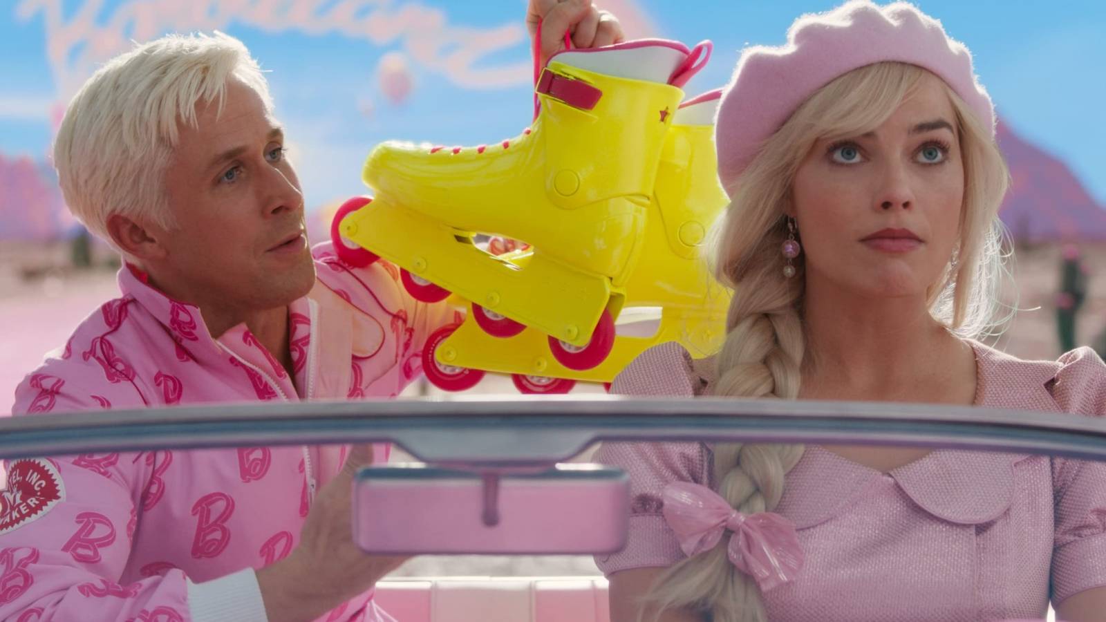 Ken (Ryan Gosling) and Barbie (Margot Robbie) in a car in Barbie