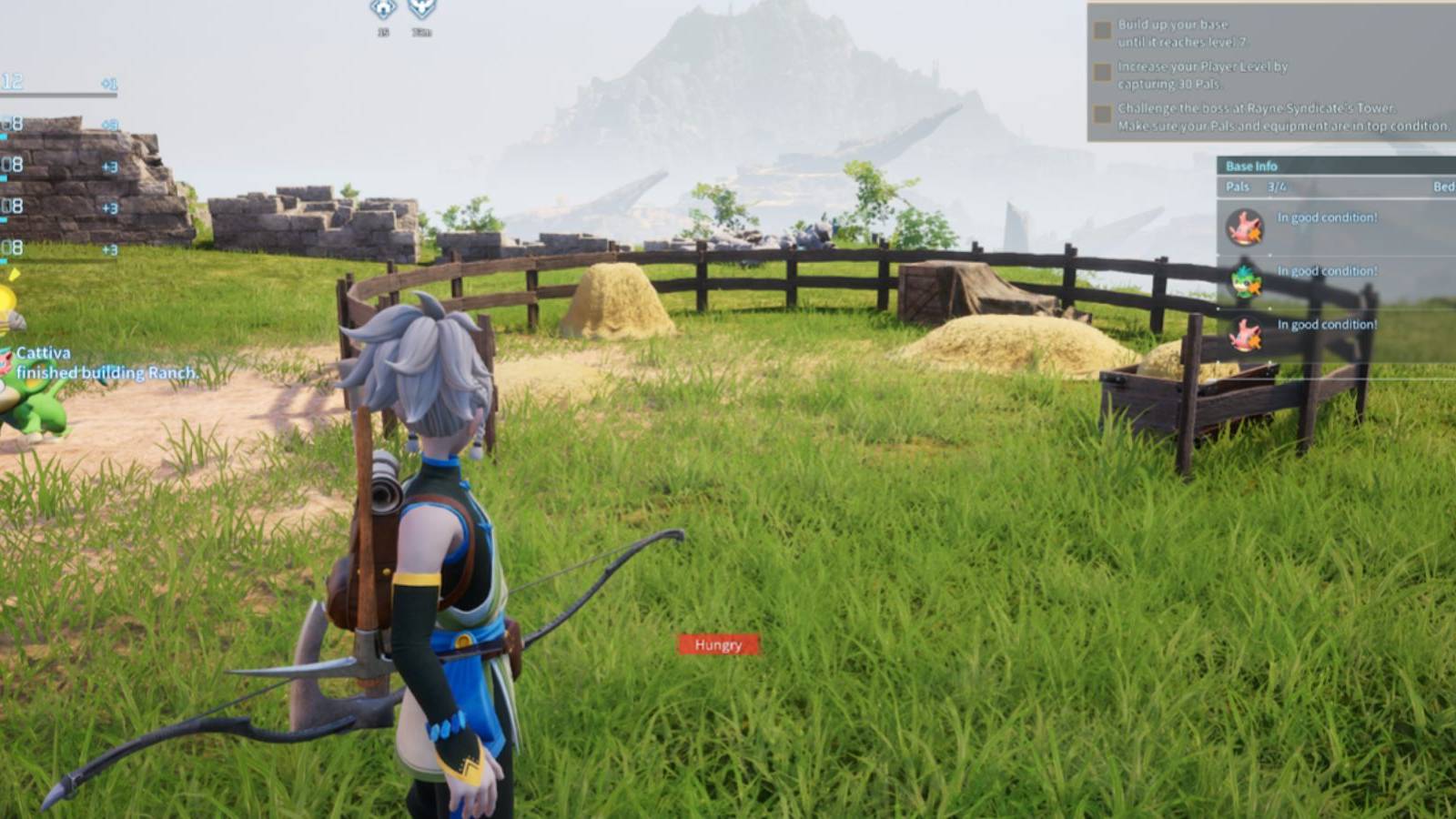 Player in a field looking at a pen