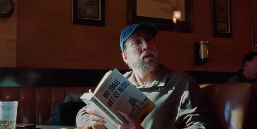 cage reading a book