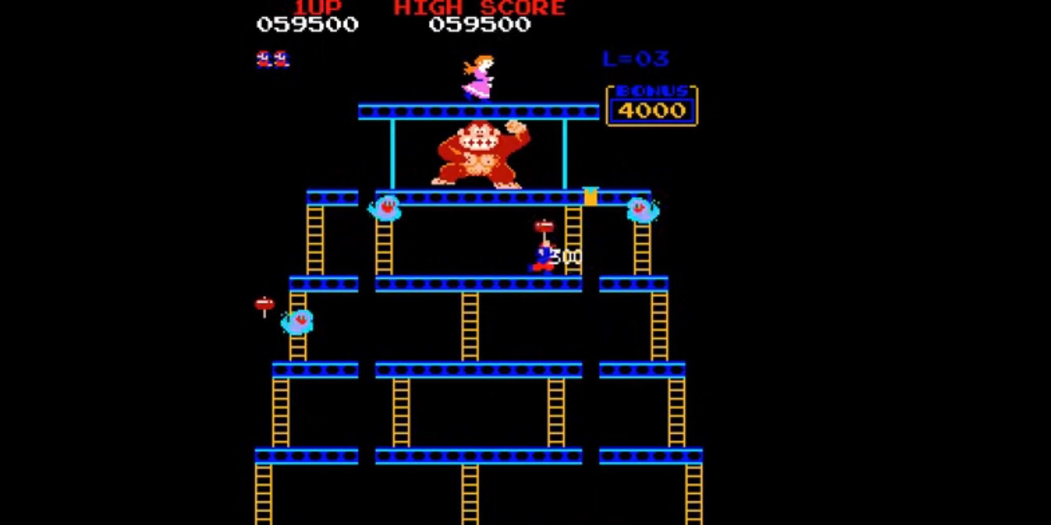 Donkey Kong And Mario Fighting While Mario Swings Hammer