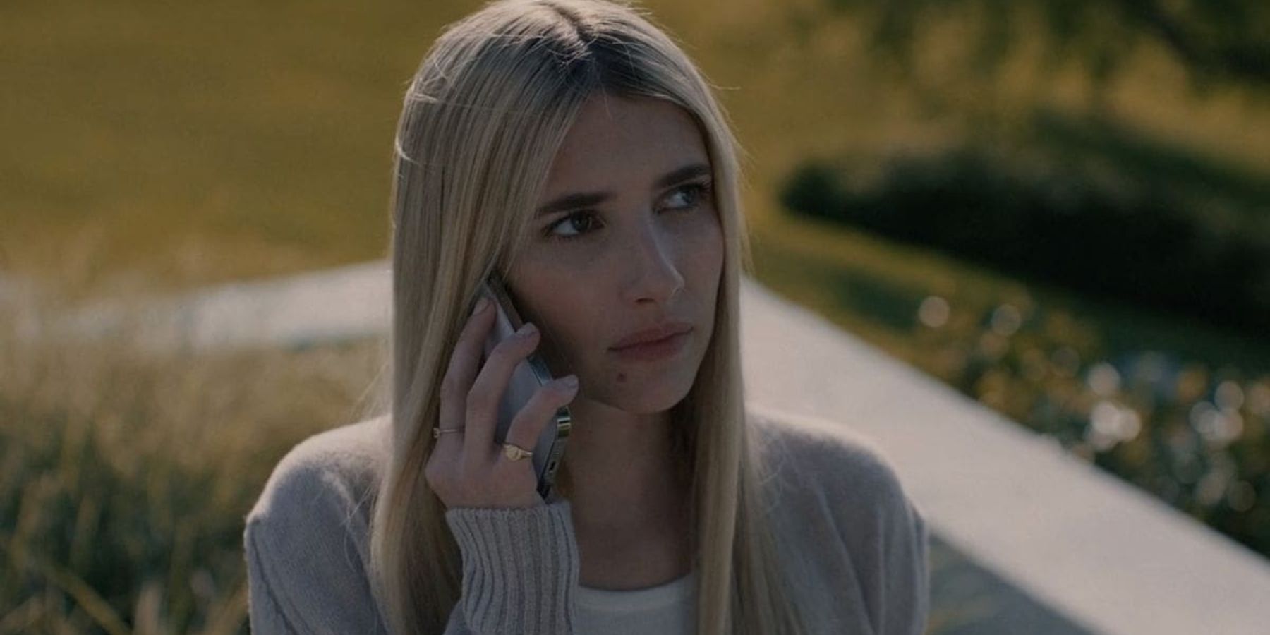 Emma Roberts as Anna talking on a cell phone in American Horror Story Season 12