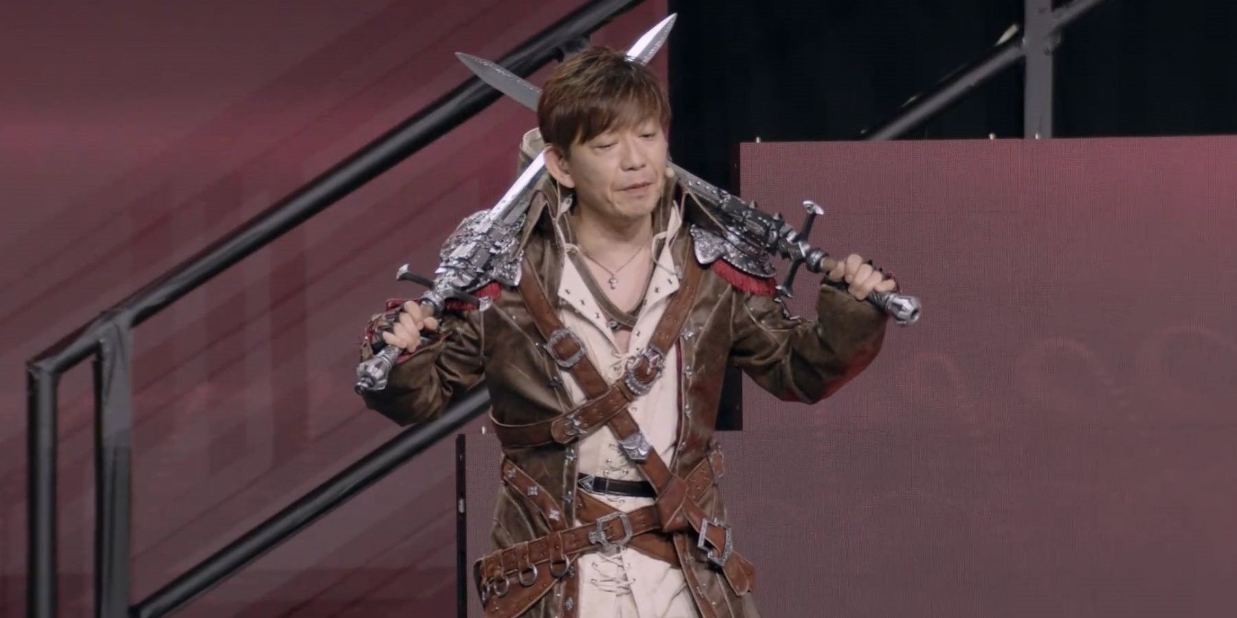 yoshi-p in the viper outfit at ffxiv fanfest 2023