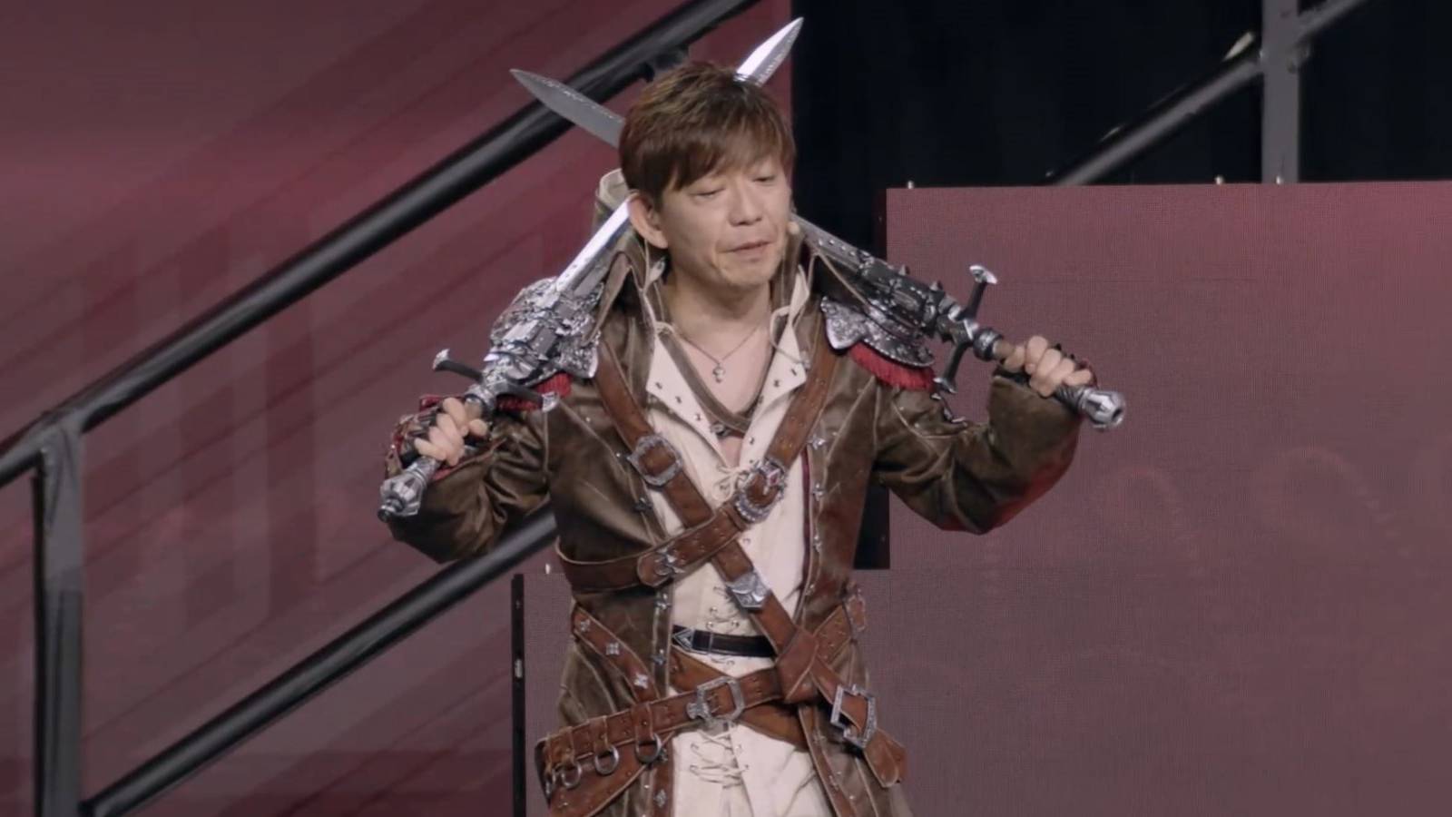 yoshi-p in the viper outfit at ffxiv fanfest 2023