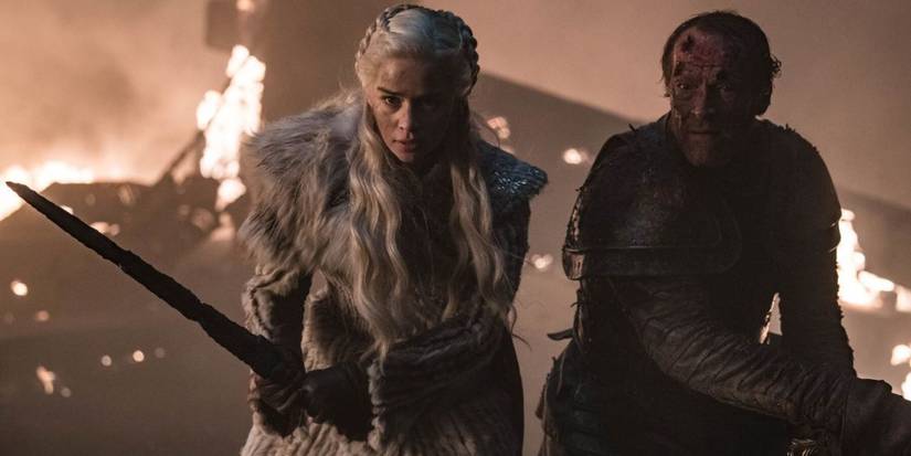 Daenerys wields a dragonglass sword alongside Jorah Mormont in Game of Thrones.