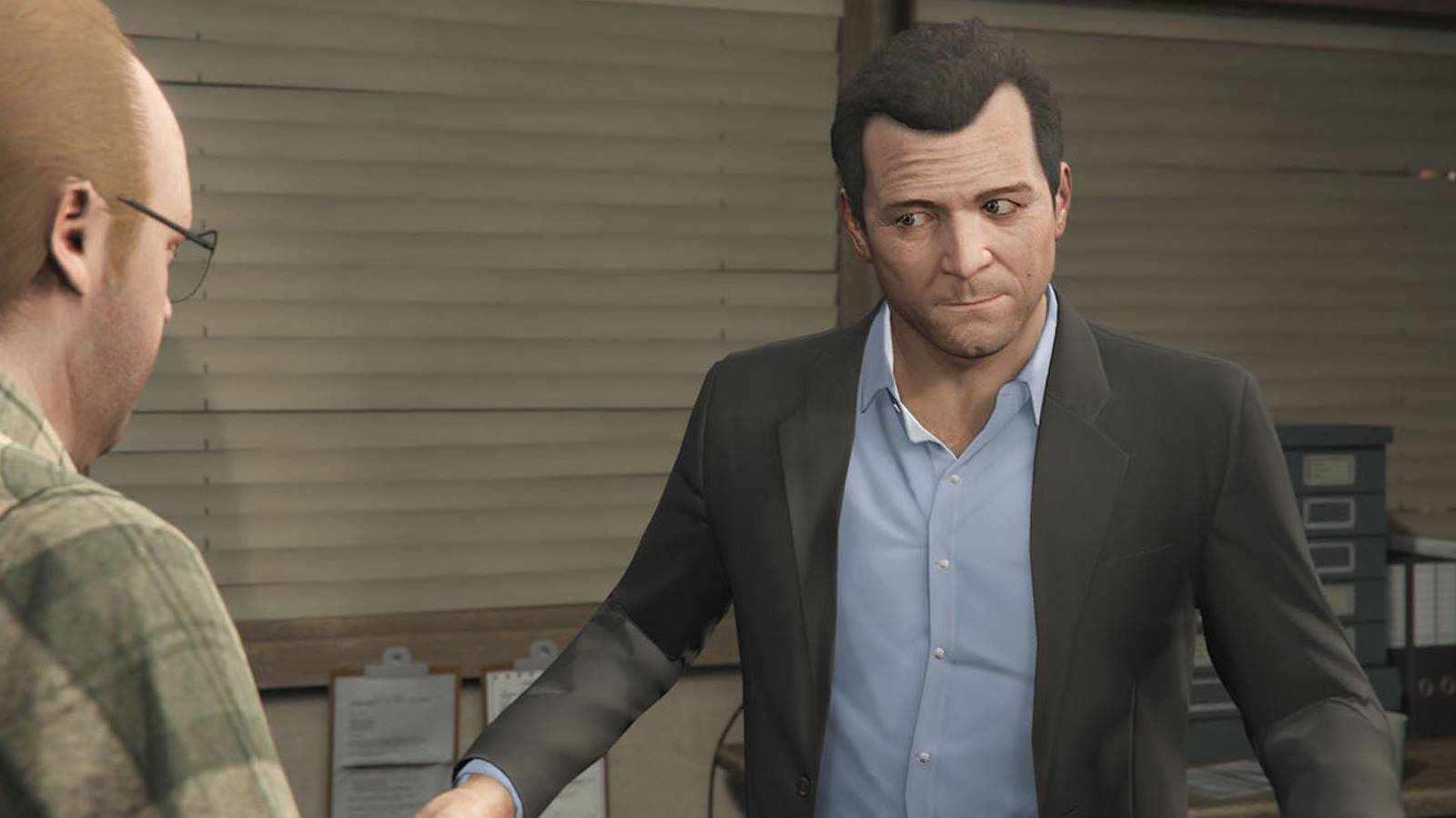 A screenshot of Michael planning a heist with Lester in Grand Theft Auto 5.
