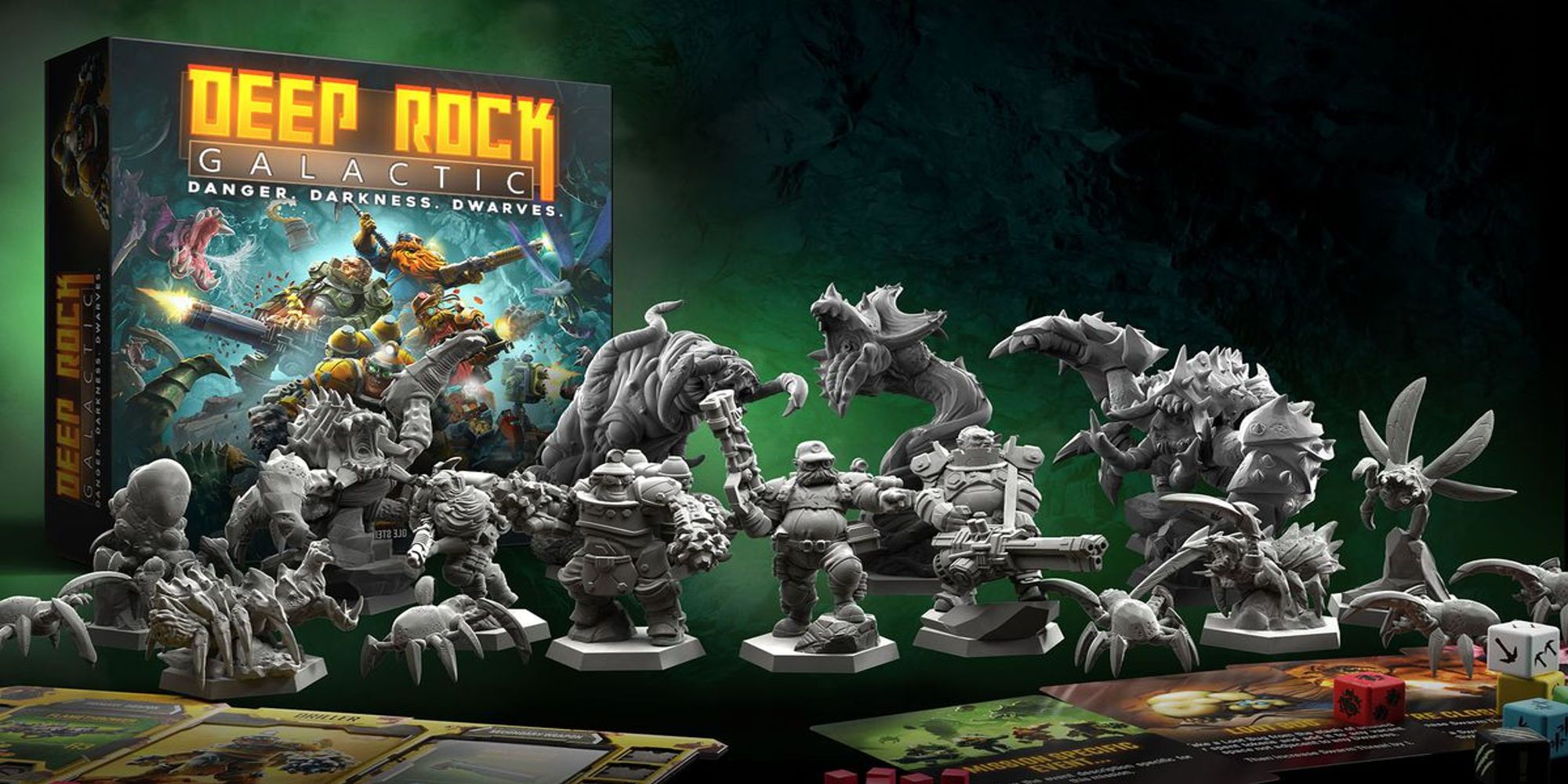 The box and miniatures for Deep Rock Galactic: The Board Game