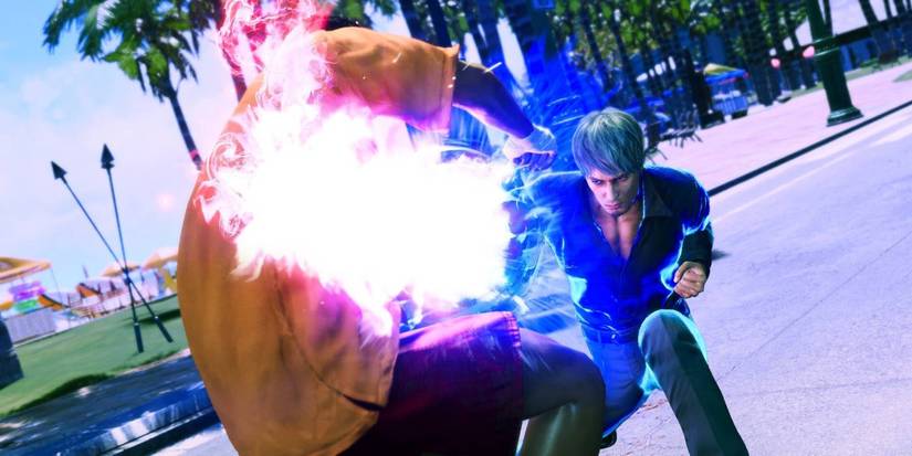 Kiryu punching an enemy in Like a Dragon: Infinite Wealth