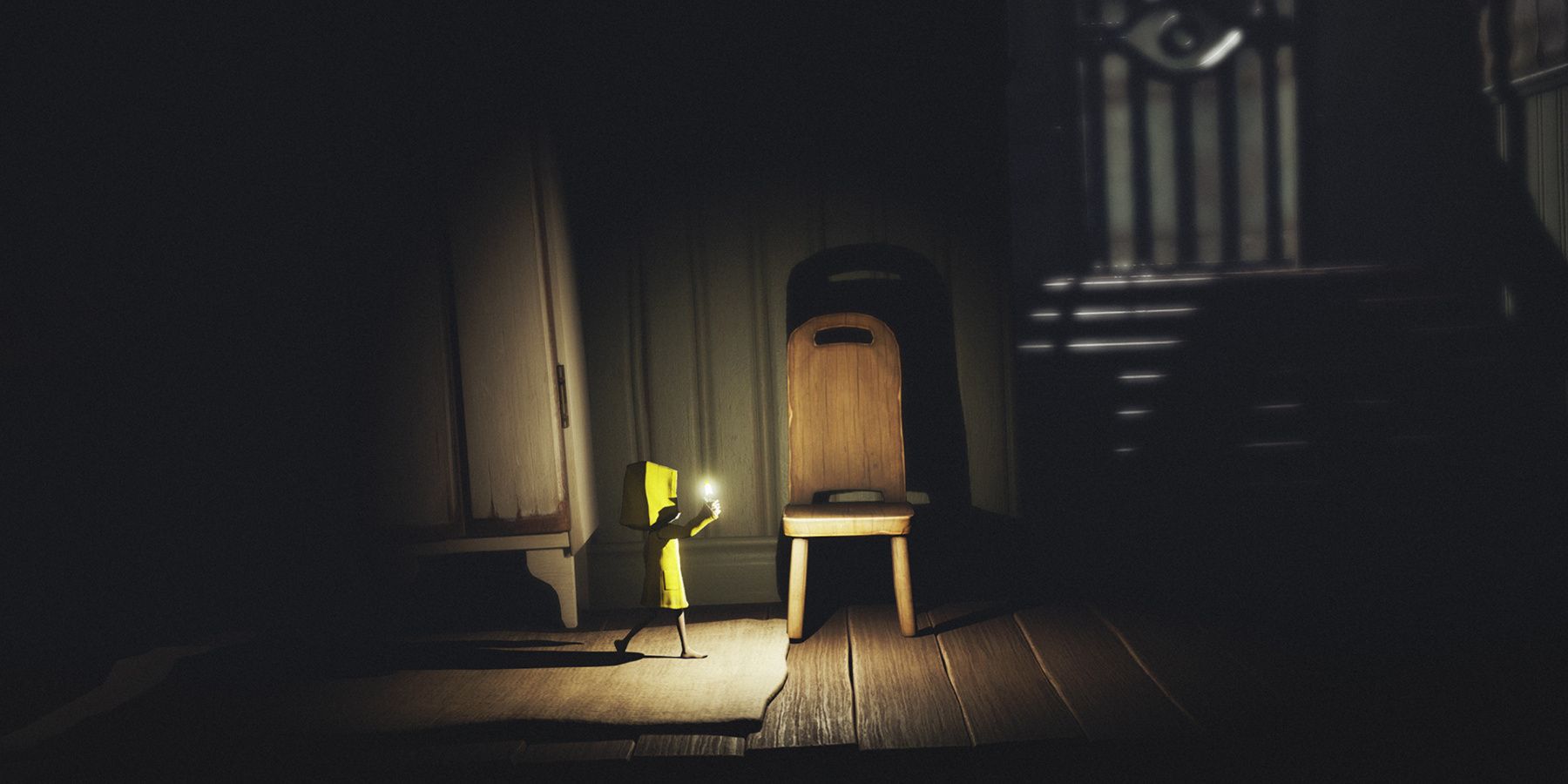 Little nightmares Mono holding a candle in a dark room