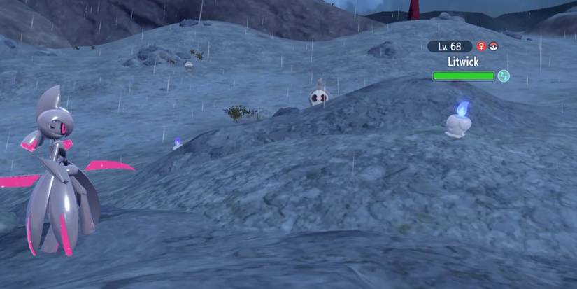 A player's Iron Valiant fighting Litwick